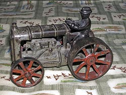 iron cast toy tractor from about 1920